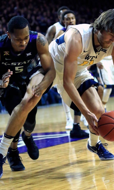 Slumping West Virginia prepares to meet No. 2 Kansas